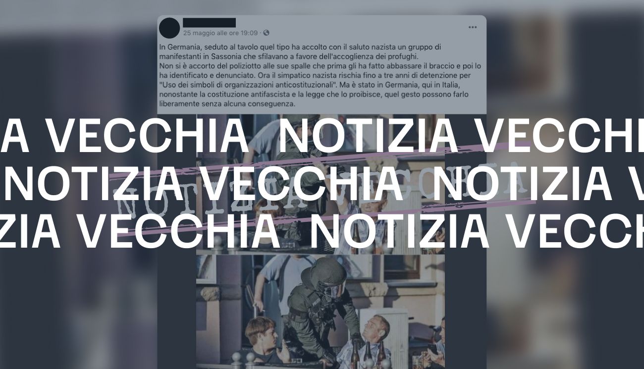 La foto del poliziotto tedesco che impedisce a un pensionato di fare il saluto romano è vera, ma risale al 2015